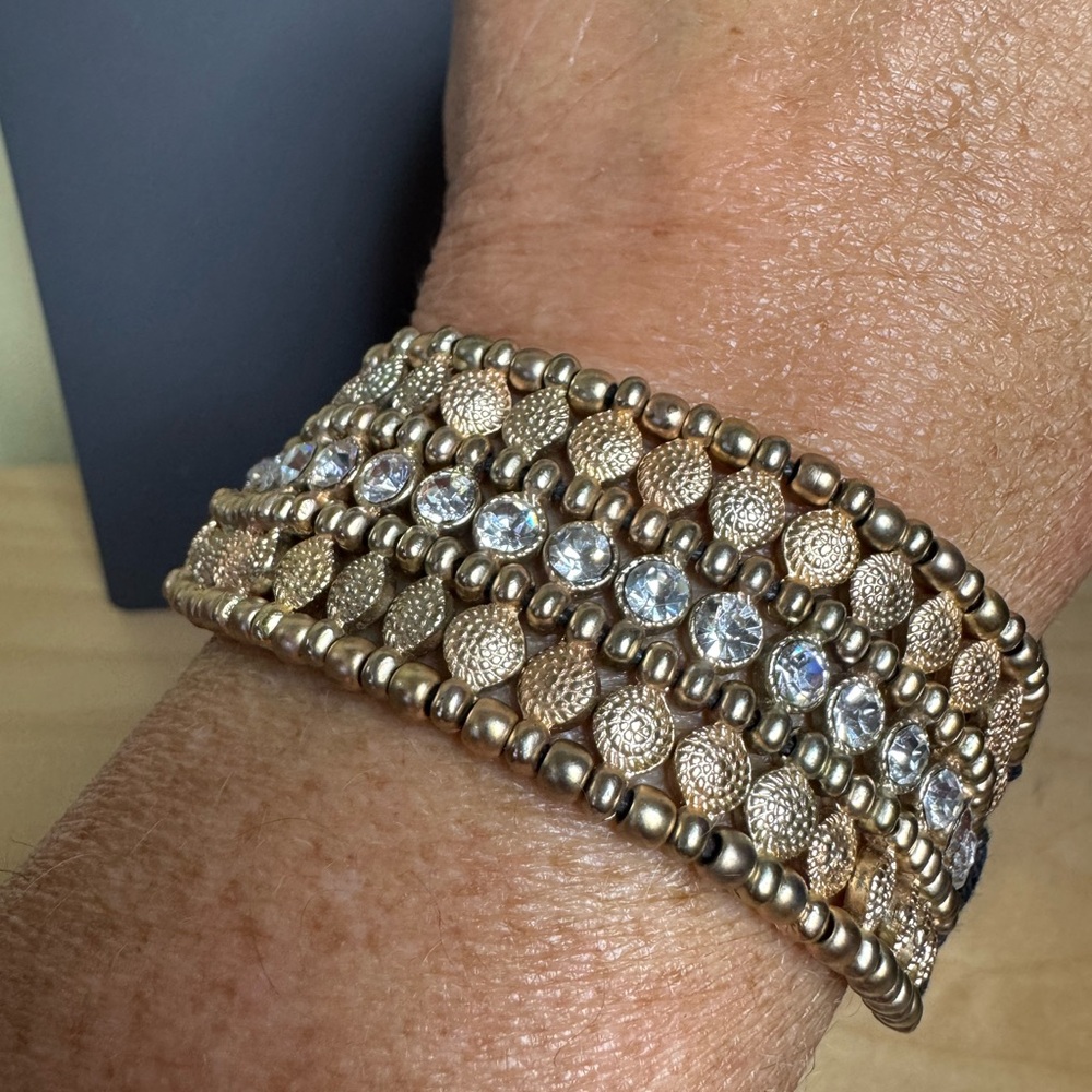 Gold tone and large rhinestone adjustable corded bracelet